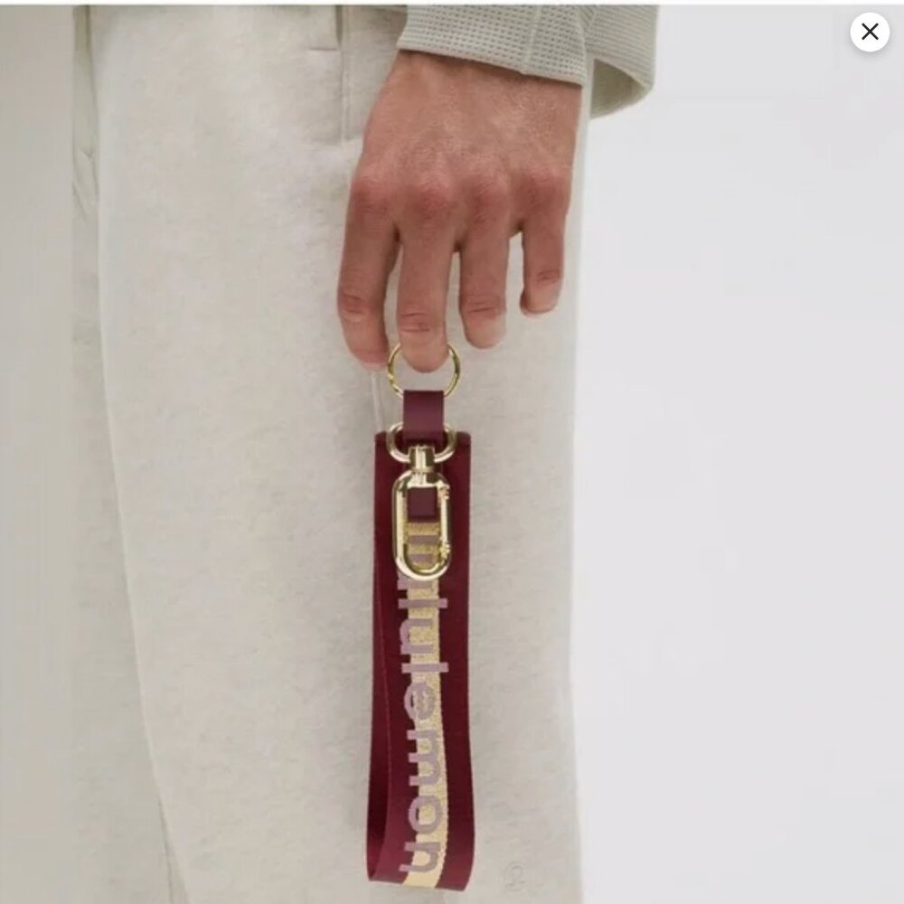 Lululemon Never Lost Keychain Burgundy and Gold